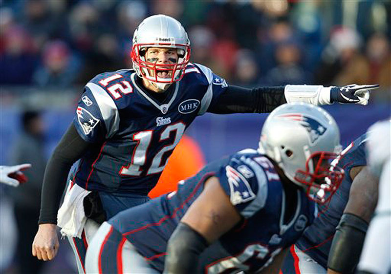 New England Patriots quarterback Tom Brady yells before the snap against the Miami Dolphins during a December game at Gillette Stadium in Foxborough, Mass. (AP Photo/Charles Krupa)