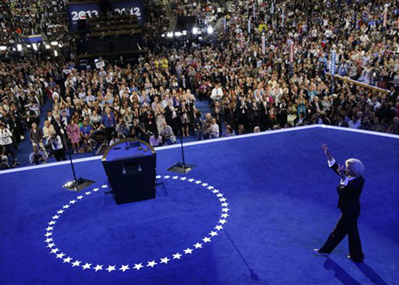 Women's rights activist Lilly Ledbetter makes her way to the podium to speak at the Democratic National Convention in Charlotte, N.C., on Tuesday, Sept. 4, 2012. (AP Photo/Charlie Neibergall)