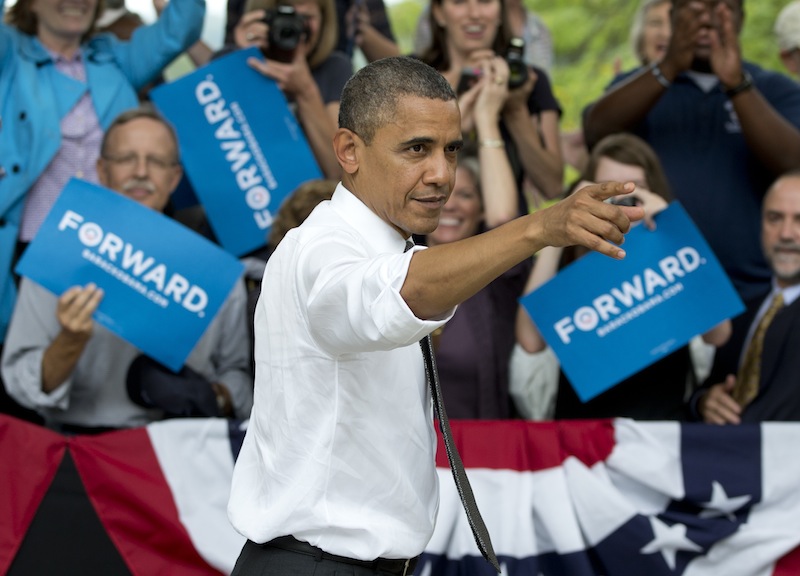 President Barack Obama points to the crowd as he leaves a campaign event at Eden Park’s Seasongood Pavilion, Monday, Sept. 17, 2012, in Cincinnati, Ohio. (AP Photo/Carolyn Kaster)