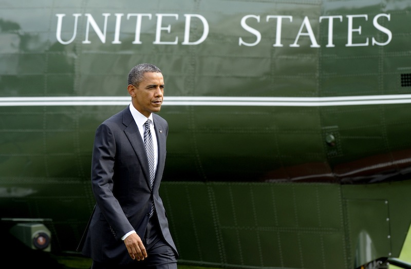President Barack Obama walks to the Oval Office of the White House in Washington, Friday, Sept. 14, 2012, after arriving on Marine One on the South Lawn. Obama went to Andrews Air Force Base to attend the transfer of remains ceremony marking the return to the United States of the remains of the four Americans killed this week in Benghazi, Libya. (AP Photo/Susan Walsh)