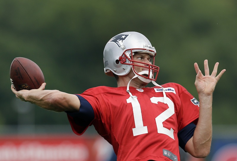 New England Patriots quarterback Tom Brady throws during practice at Gillette Stadium in Foxborough, Mass. Wednesday, Sept. 5, 2012. The Patriots are preparing for their NFL football season opener against the Tennessee Titans on Sunday. (AP Photo/Elise Amendola)