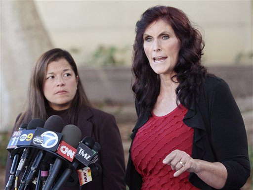 Cindy Lee Garcia, right, one of the actresses in "Innocence of Muslims," and attorney M. Cris Armenta hold a news conference before a hearing at Los Angeles Superior Court in Los Angeles on Thursday.