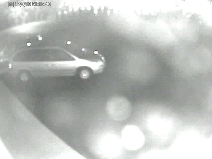 An exterior surveillance camera shows the vehicle police believe was used by the robber.