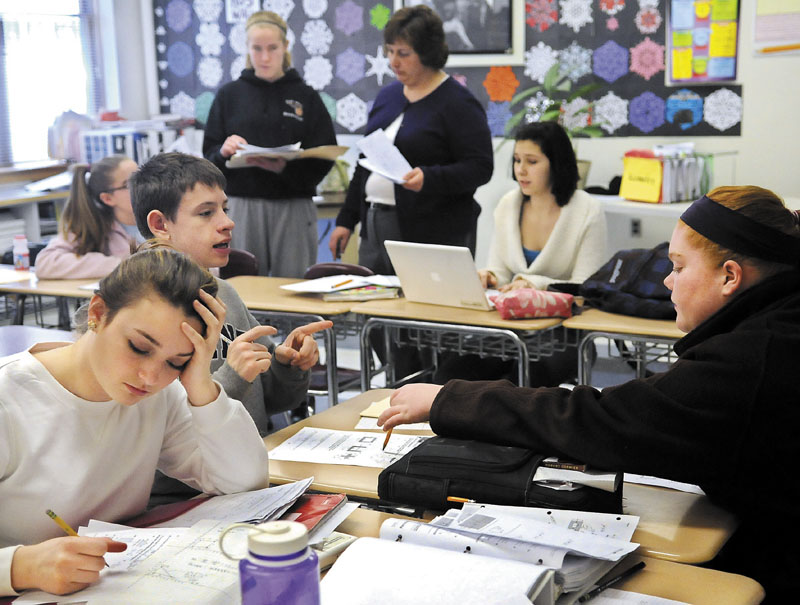 Hall-Dale High School students work on a geometry lesson last year in Kendra Guiou’s classroom in Farmingdale. Most area high schools start classes at times that sleep experts say run counter to adolescent biology.