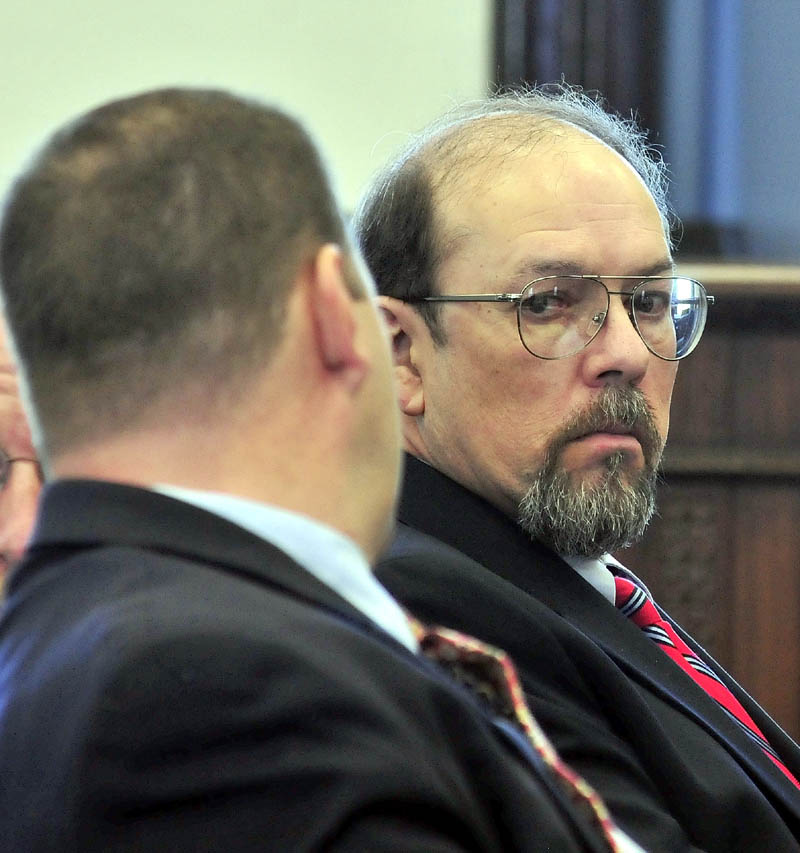 Murder defendant Jay Mercier looks around in court during his trial in Somerset County Superior Court in Skowhegan on Thursday. He is charged with killing Rita St. Peter 32-years-ago.