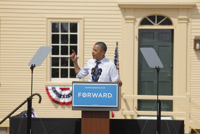 President Barack Obama addresses a crowd of supporters during a campaign stop with first lady Michelle Obama, Vice President Joe Biden and Jill Biden in Portsmouth, N.H., on Friday.
