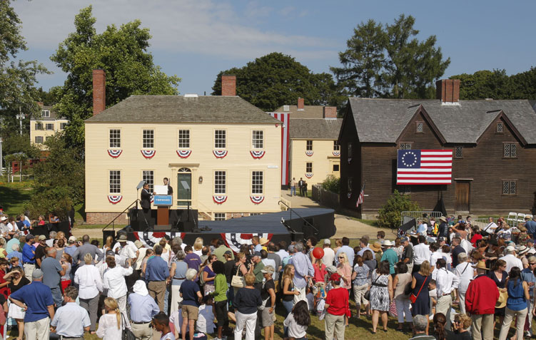 The field at the Strawbery Banke Museum in Portsmouth, N.H., where President Obama will speak later Friday is lined by historic homes.