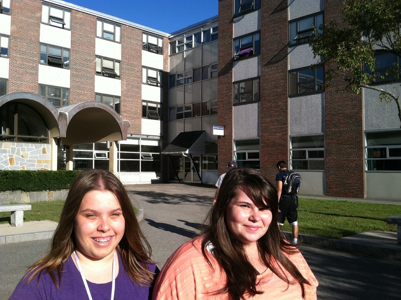 Marnie Lantagne, left, of Arundel and Danielle Dalton of Saco stand in front of their dormitory, Upton-Hastings, at USM on Monday. They said the arson fire that forced 200 students to evacuate the dorm early Monday makes them nervous.