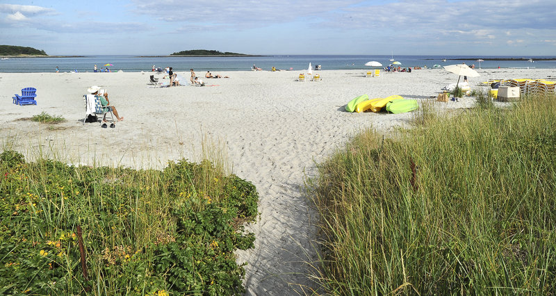 This July 2011 file photo shows a small public path that leads to a small section of public beach at Goose Rocks Beach in Kennebunkport.