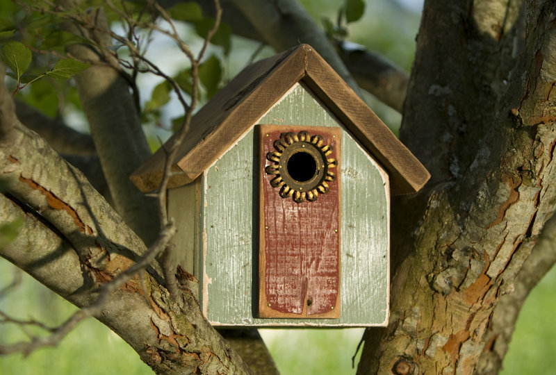 No birdhouse made by Little is like another. He often uses interesting old metal pieces for the feeder hole or perch area.