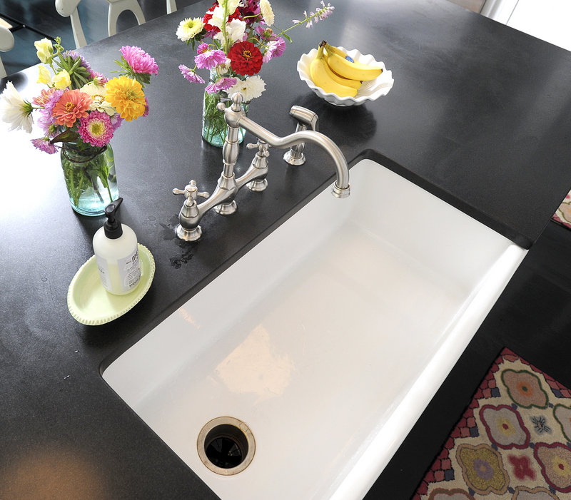 Christine Laughlin favors “the traditional coastal look,” which in her kitchen includes a couple of farmhouse sinks.