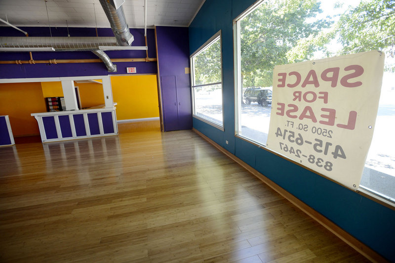 A sign advertising space for lease hangs in the former Zumba studio of Alexis Wright on Kennebunk’s York Street on Wednesday. Wright’s studio didn’t do much business, says a neighbor who wondered how she paid her rent.
