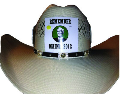 Members of Texas’ Republican National Convention delegation sympathetic to Maine’s Ron Paul supporters made these stickers, as seen here on a Texan’s cowboy hat.