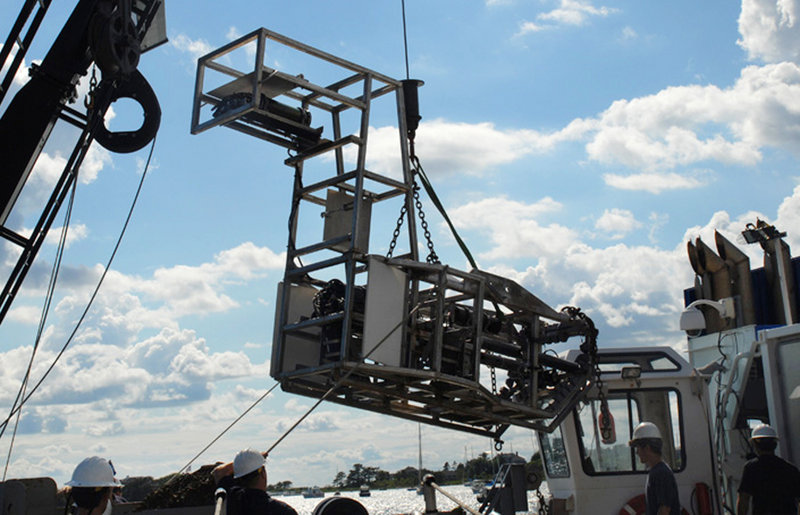 Seahorse, a state-of-the-art underwater mapping camera, is loaded onto a research vessel in Lewes, Del. Developed to get better information about scallops, Seahorse has proved useful in capturing details of other marine life, too.