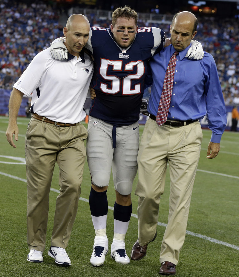 Dane Fletcher is helped off the field after tearing the ACL in his left knee in the first quarter of the Patriots’ first preseason game against the New Orleans Saints.