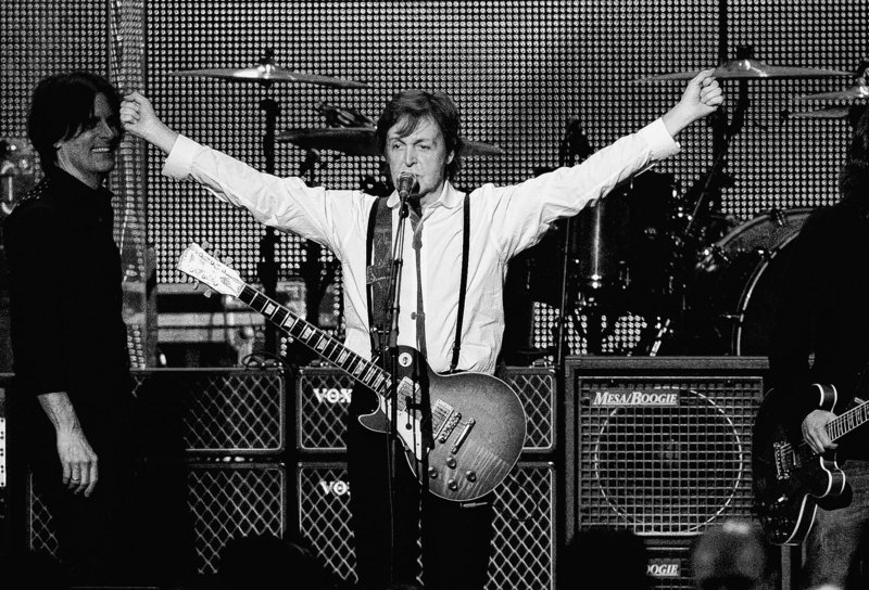 Paul McCartney performs at the MusiCares Person of the Year gala in his honor in Los Angeles on Feb. 10. The former Beatle will be decorated with the rank of officer by French President Francois Hollande in a ceremony Saturday in Paris.
