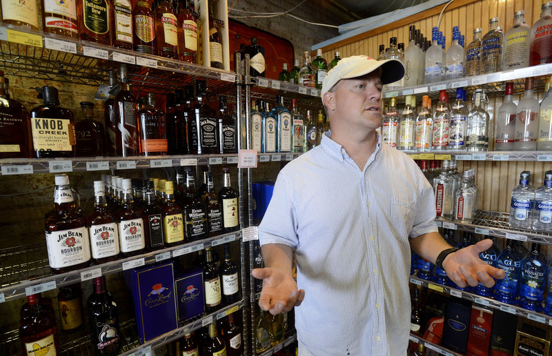 Doug Weber, owner of Downeast Beverage in Portland talks about the liquor business at his store on Commercial Street on Thursday, Sept. 6, 2012.