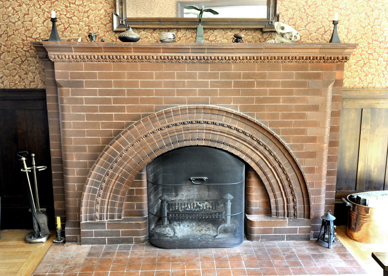 The fireplace in the living room with its “egg and dart” detailing.