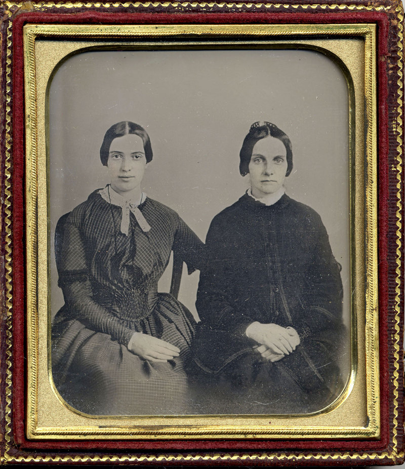 This photo released Friday, Sept. 7, 2012 by Amherst College Archives and Special Collections, and the Emily Dickinson Museum, in Amherst, Mass., shows a copy of a circa 1860 daguerreotype purported to show a 30-year-old Emily Dickinson, left, with her friend Kate Scott Turner.