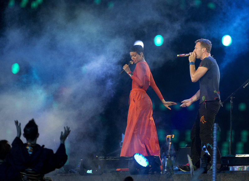 Rihanna performs with Chris Martin, lead vocalist of Coldplay, during the closing ceremony for the 2012 Paralympic games Sunday in London.