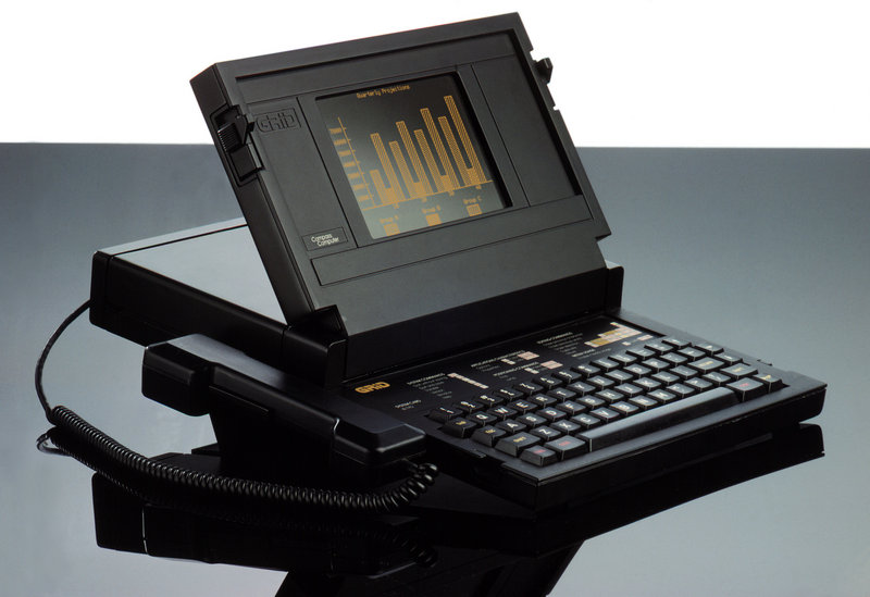 The Grid Compass computer was designed by Bill Moggridge, below. It sold for $8,150 when it was released in 1982. It was encased in magnesium and was used by the U.S. military. The computer went into space aboard the shuttle Discovery in 1985.