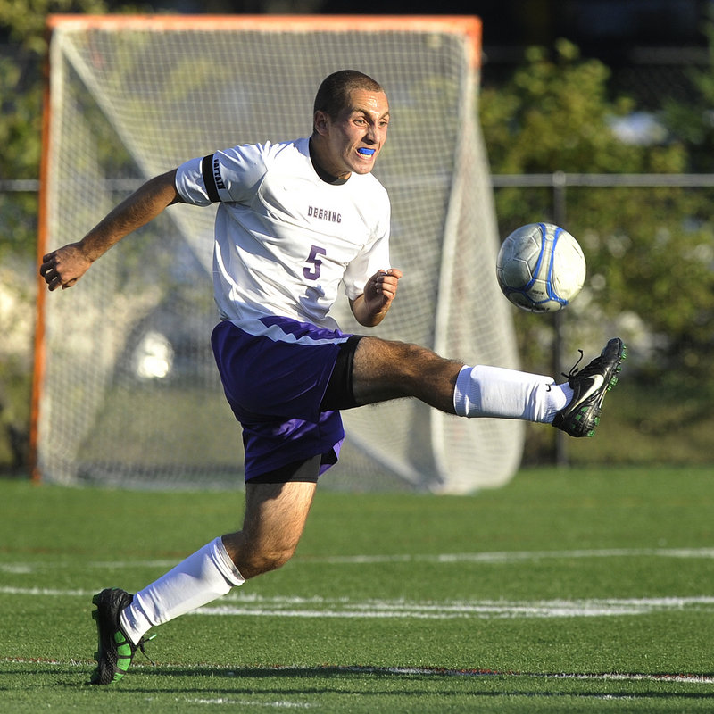 Nathan Finberg of Deering reaches out to control a long pass during Monday’s SMAA boys’ soccer game against Gorham at Deering’s Memorial Field. Gorham is 3-0-1 after its 2-1 win.