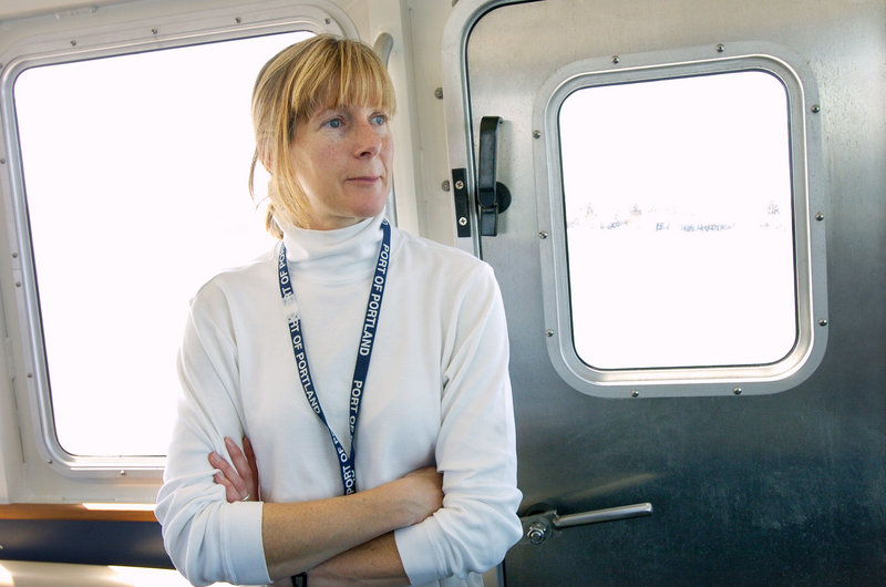 In this 2005 file photo, Capt. Susan Clark rides back into Portland after piloting an oil tanker out of Portland Harbor. Clark, the harbor's first female pilot, died Thursday at 48 after a brief battle with cancer.