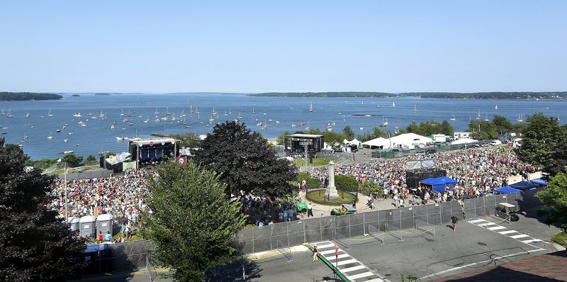 Thousands gathers on Portland's Eastern Promenade for the "Gentlemen of the Road" music festival earlier this summer. This city and Munjoy Hill residents are debating whether to host more large concerts on the Promenade in future years.