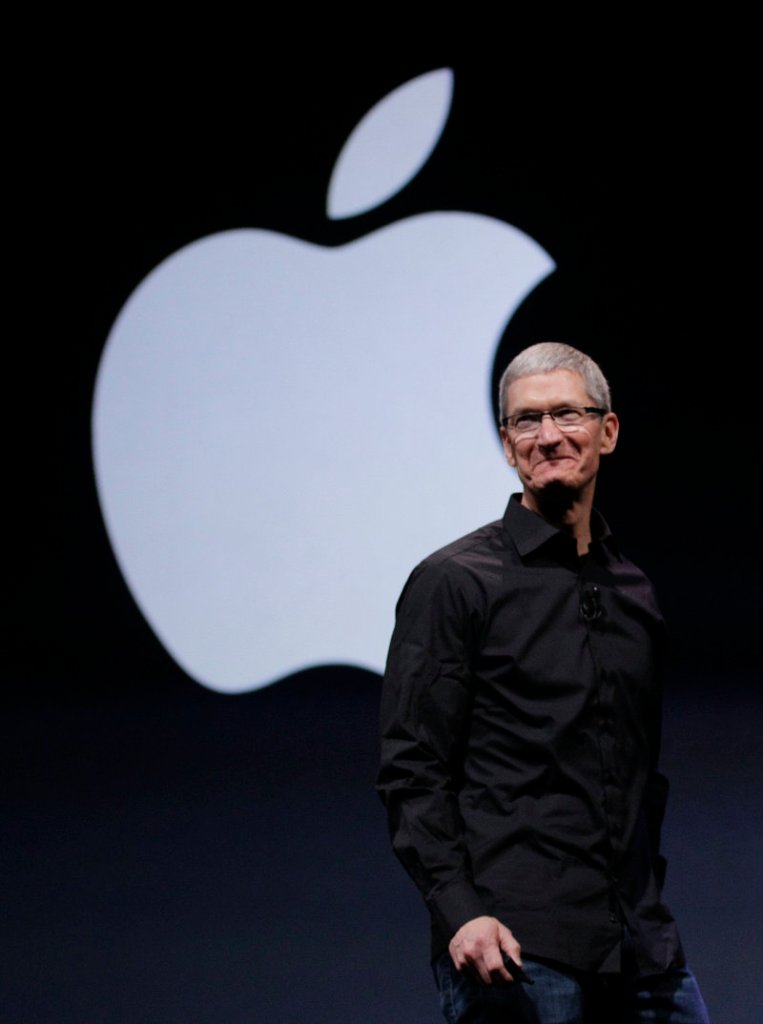 Apple CEO Tim Cook introduces the upgrades in the iPhone 5 in San Francisco on Wednesday.