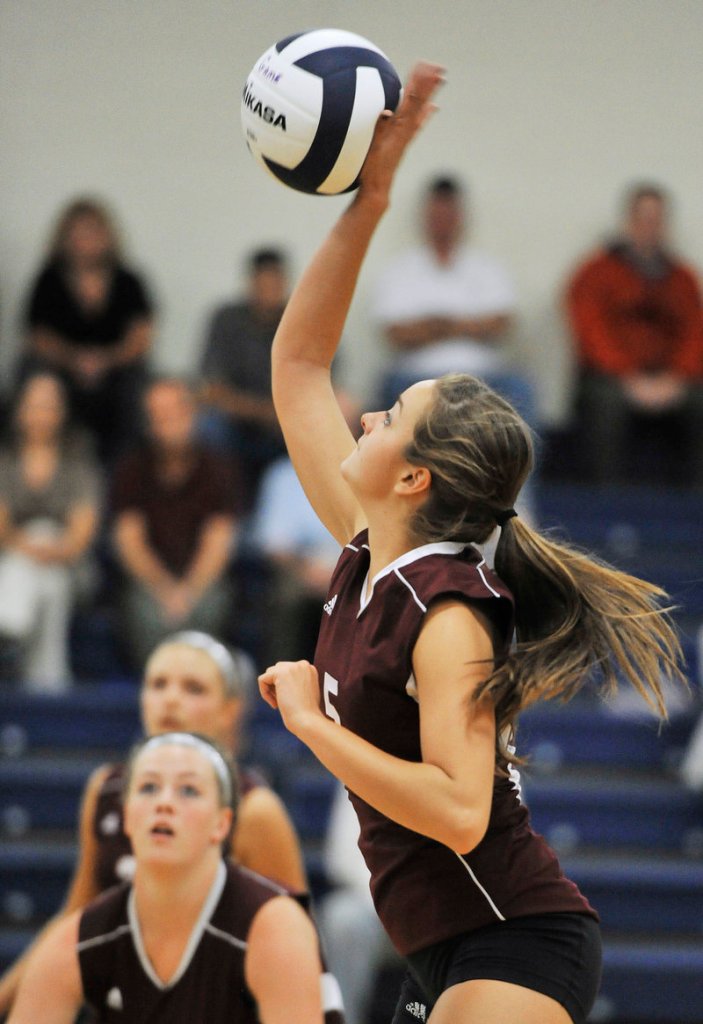 Quincy Shaw of Gorham goes for a kill shot Wednesday night during the showdown match against Yarmouth in volleyball. Gorham, on the road, won in straight games in a match between teams that entered with undefeated records.