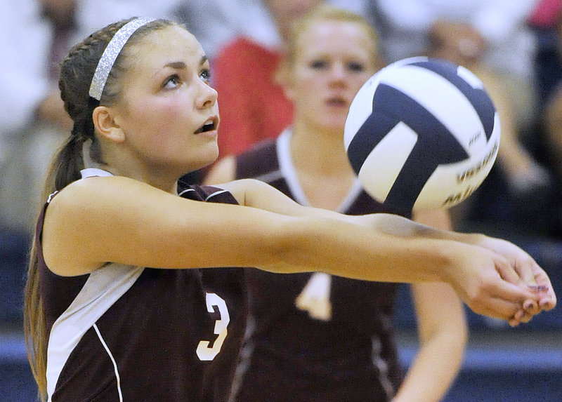 Kaitlyn Seehusen of Gorham keeps her eyes in position while setting up a shot for a teammate.