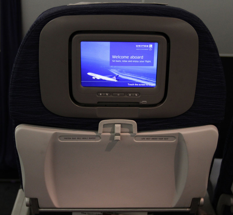 Seat-back monitors are becoming more common on new aircraft, but many airlines charge for on-demand movies and television.