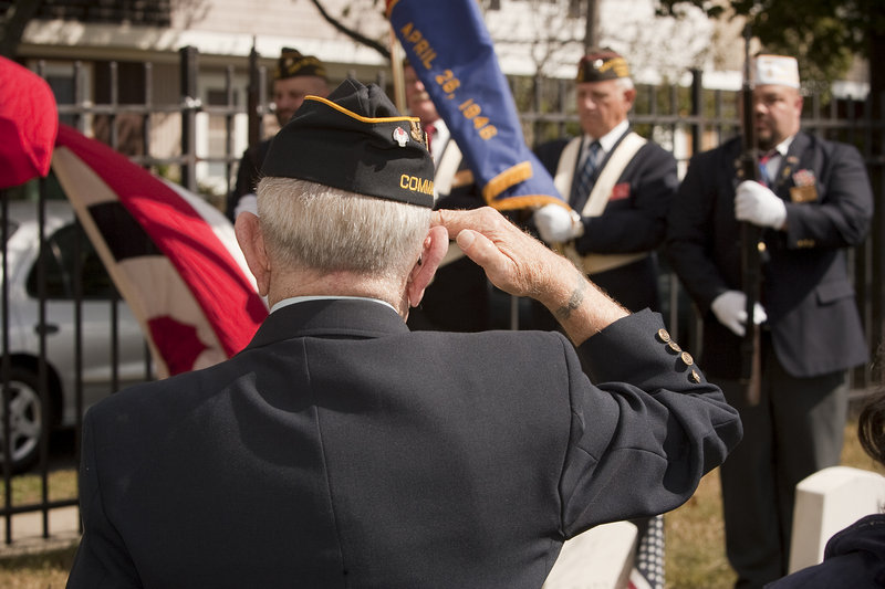 A color guard honors Richard Hill, an African-American veteran of the War of 1812, whose grave was rediscovered at Eastern Cemetery in Portland, on Saturday.