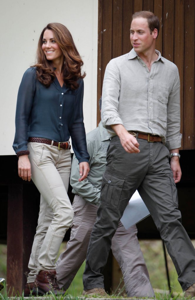 Prince William and Kate, the Duchess of Cambridge, arrive at a Malaysian research center Saturday.