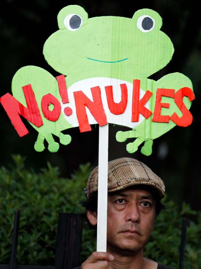 A protester demonstrates near the office compound of Prime Minister Yoshihiko Noda in Tokyo in August. Popular opinion in Japan has turned against nuclear power.