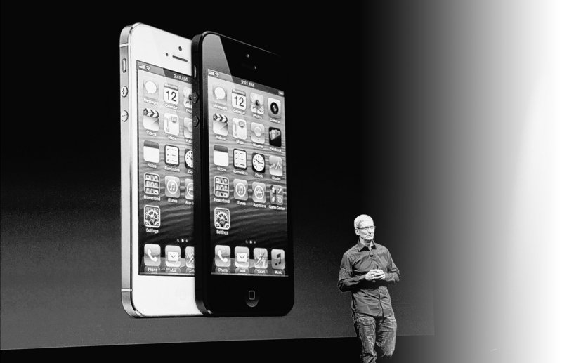 Apple CEO Tim Cook introduces the new iPhone 5 during a product unveiling at the Yerba Buena Center for the Arts in San Francisco, Calif., this month.