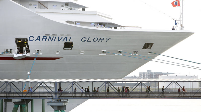 Passengers disembark from the cruise ship Carnival Glory at the Ocean Gateway berth in Portland on Tuesday, Sept. 18, 2012.