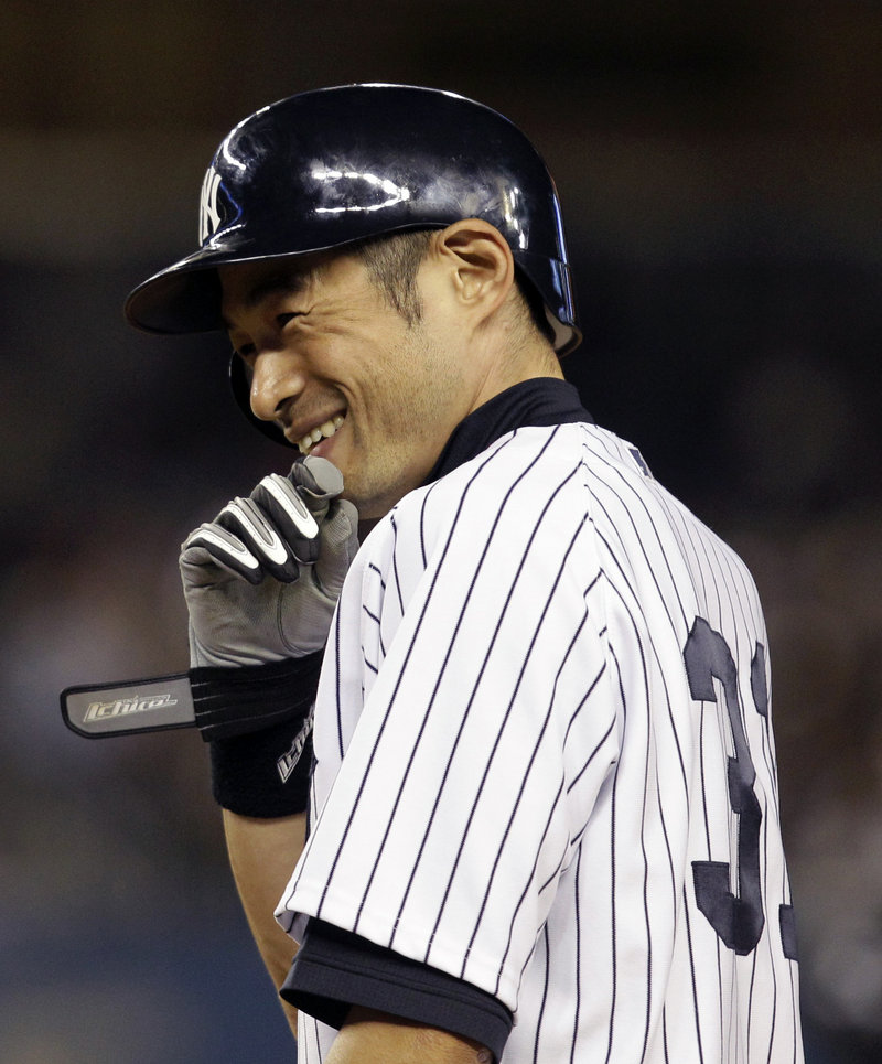 Ichiro Suzuki is all smiles after driving in the winning run of Wednesday’s second game. The Yanks swept the Blue Jays, 4-2 and 2-1. Suzuki was 7 for 8 in the sweep.