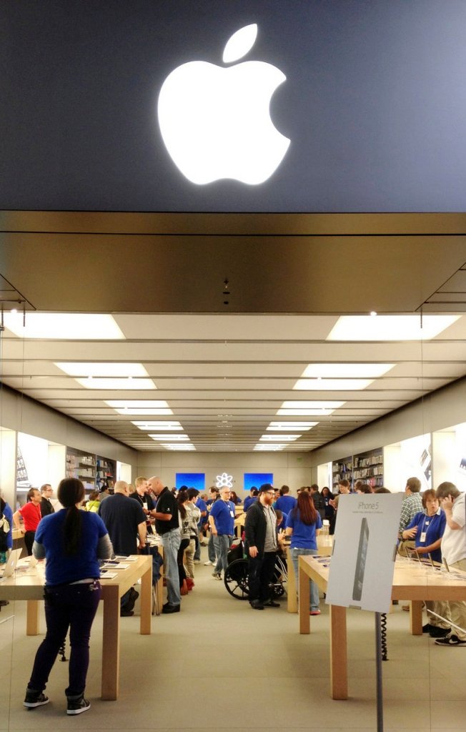 People pack The Apple Store at The Maine Mall on Friday, Sept. 21, 2012, the first day the iPhone 5 was available.
