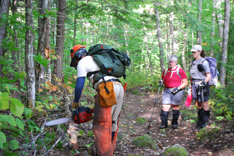 Don Miskill of Harpswell, left, volunteers on the L.L. Bean section of the Appalachian Trail with Lisa Richard, middle, and Laurie Gonyea.