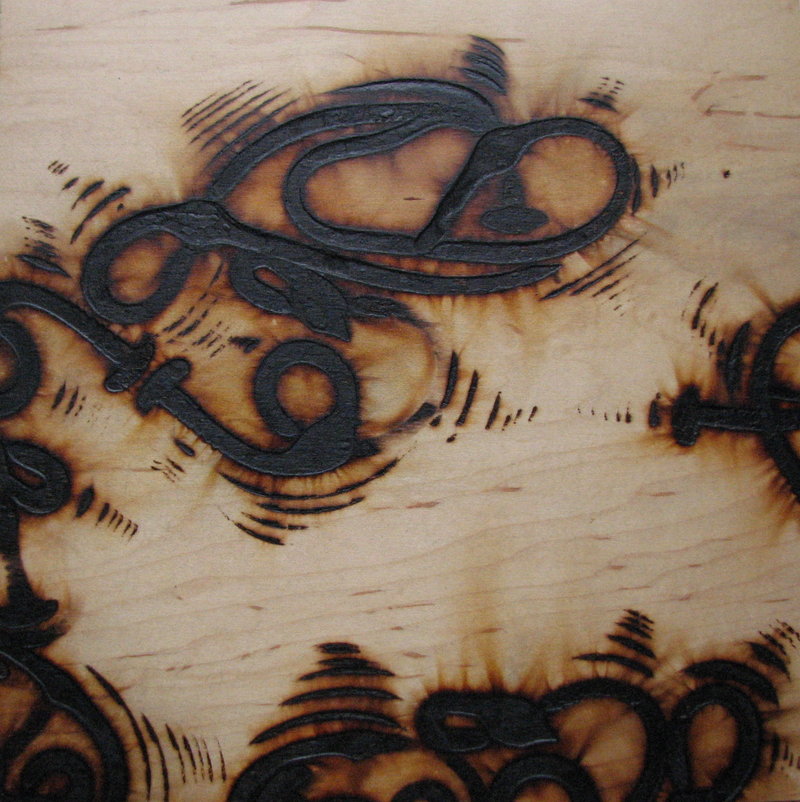 “Branded Thang,” burned birch ply, by John Bisbee
