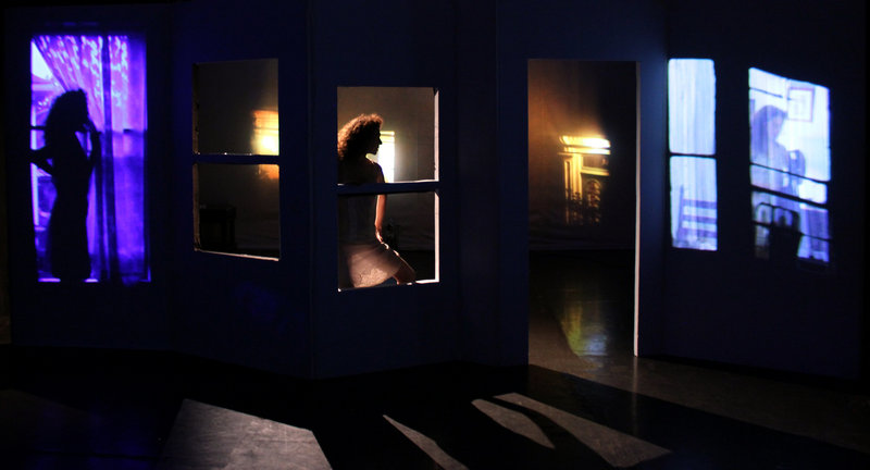 In “Voyeur,” dancers will perform in front of and behind the set, with cameras projecting live images to the audience when they perform out of view of a door or window. The audience will also see projected footage shot in and around Portland.