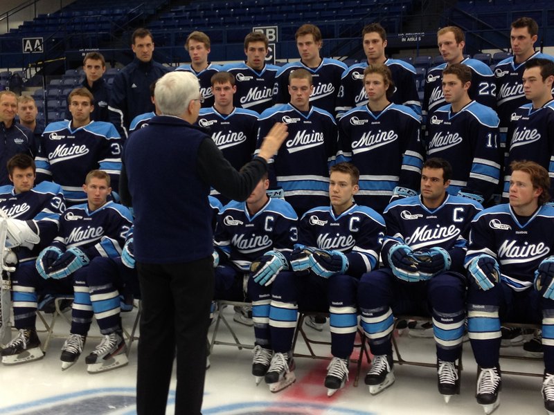 Paul Ferguson, president of the University of Maine, talks to the men’s hockey team at Wednesday’s team photo and media session at Alfond Arena in Orono. Ferguson wished the players well and reminded them of their role as representatives of the school and state.