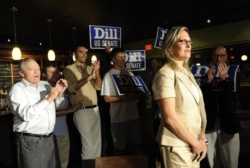 Cynthia Dill, seen June 12, when she won the Democratic U.S. Senate primary, earned her place on the November ballot and has no reason to step aside, her campaign says.