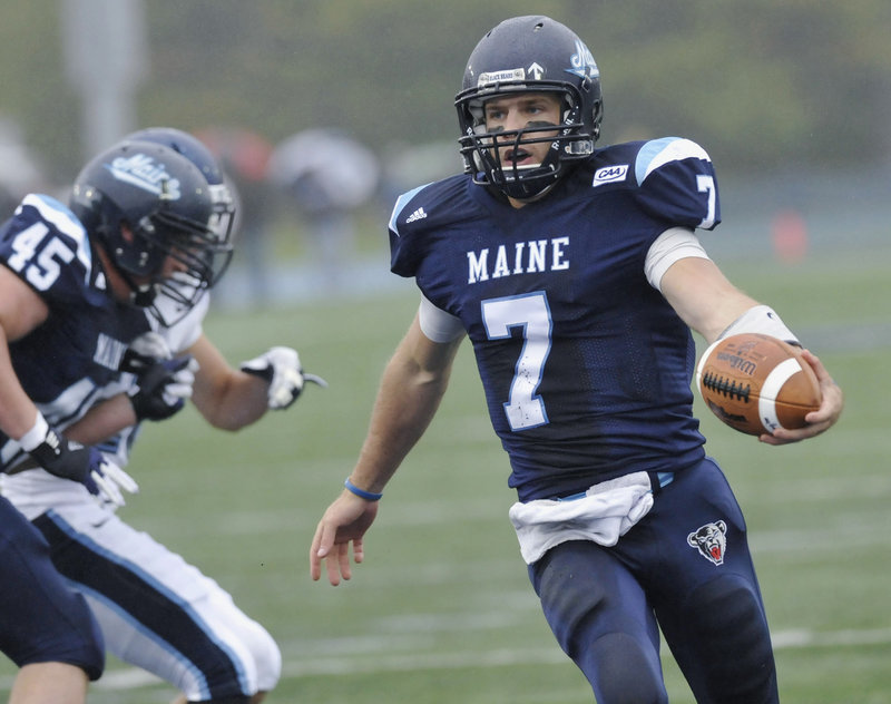 Maine quarterback Marcus Wasilewski takes the ball into the end zone – one of the two touchdowns for the Black Bears against Villanova.