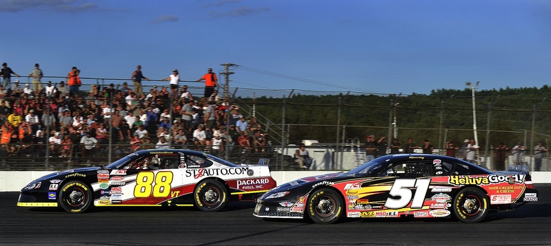 Racers compete in the 2011 TD Bank 250 at Oxford Plains Speedway. The TD Bank 250, the biggest single-day short-track event in the United States, will continue under the speedway's new owner.