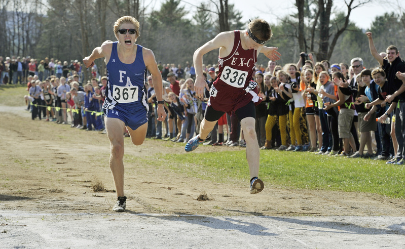 Dan Curts, right, of Ellsworth just beats out Silas Eastman of Fryeburg Academy in the Class B boys’ race, which was the closest of the day.