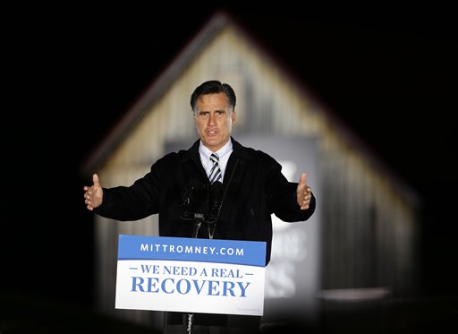 FILE - In this Oct. 17, 2012, file photo, Republican presidential candidate, former Massachusetts Gov. Mitt Romney speaks during a campaign event in front of a barn at Ida Lee Park in Leesburg, Va. President Barack Obama and Romney are engaged in an all-out effort to court women in the campaign�s closing weeks, knowing that women could help determine the winner in a series of toss-up states. Women have emerged as the pivotal voting bloc in the aftermath of the second presidential debate, where Obama and Romney sparred over contraceptives and pay inequality. (AP Photo/Alex Brandon, File)