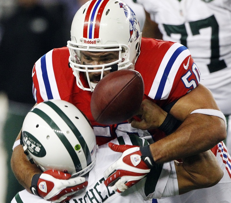 New England Patriots defensive end Rob Ninkovich sacks New York Jets quarterback Mark Sanchez to clinch a 29-26 Patriots win in overtime Sunday at Foxborough, Mass. NFLACTION12