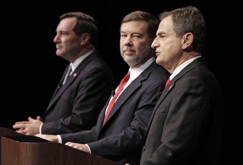 Candidates for Indiana's U.S. Senate seat Democrat Joe Donnelly, left, Libertarian Andrew Horning, center, and Republican Richard Mourdock participate in a debate in New Albany, Ind., Tuesday, Oct. 23, 2012. (AP Photo/Michael Conroy)